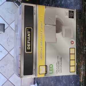 Motion security light never opened or used except in picture for sale